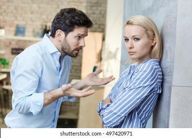 Sulky Woman, Explaining Man At Home. Relationship Difficulties.