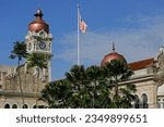 Sultan Abdul Samad building during a blue sky sunny day at Merdeka Independence square in Kuala Lumpur, Malaysia.