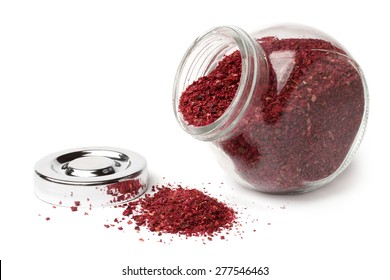 Sumac spice in glass jar on white background - Powered by Shutterstock