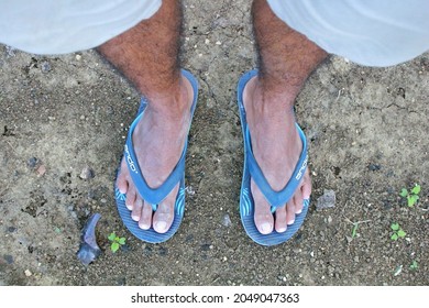 Sumenep Madura Indonesia 28 September 2021, Hairy Shorts, Sandals, Legs, And Calves