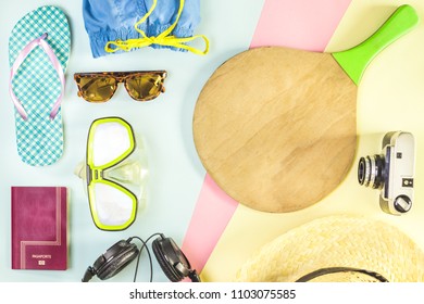 Summer accessories, flip-flops, camera, hat, sunglasses, music helmets, passport. Concept of trips