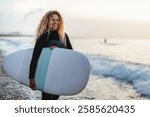 Summer adventure water sports concept. Happy carefree woman surfing, living healthy active lifestyle