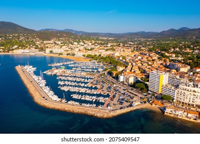 Summer aerial view of French coastal town of Sainte-Maxime on Mediterranean coast overlooking marina - Shutterstock ID 2075409547