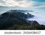 Summer and afternoon view of Beombong Peak and Dinosaur Ridge with sea of clouds at Seoraksan Mountain near Sokcho-si, South Korea
