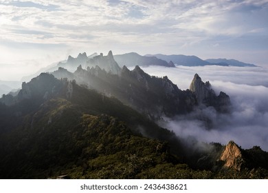 Summer and afternoon view of sea of clouds on Beombong Peak and Dinosaur Ridge at Seoraksan Mountain near Sokcho-si, South Korea
 - Powered by Shutterstock