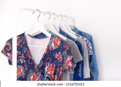 Summer, Autumn, Spring Clothes Hanging On A Rack, Trending Concept