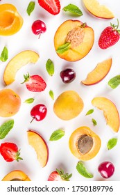 Summer Background With Fresh Fruits And Berries On White Background. Set Of Various Seasonal Fruit And Berry  - Strawberry, Apricots, Peach Slices, Cherry, Mint. Flat Lay. Summer Fruits Concept. 