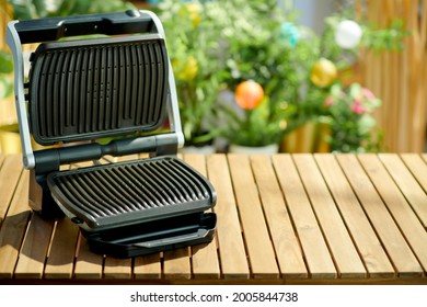 Summer Backyard Picnic. Table With Electric Grill.