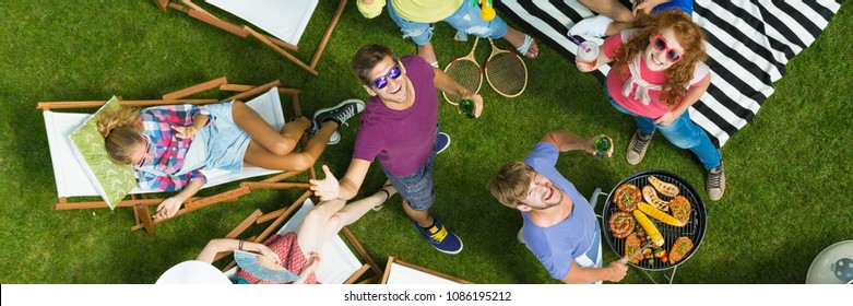 Summer Barbeque Party With Friends In A Garden