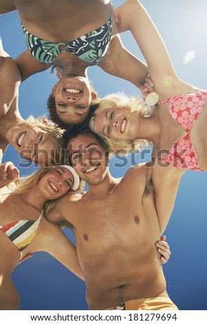 Similar – Young people with their heads together having fun