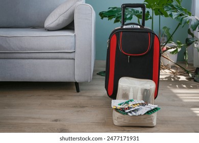 Summer beach accessories for your sea holiday and pills. Concept of medication required in journey. - Powered by Shutterstock