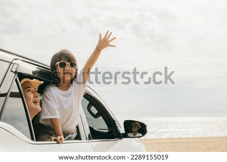 Summer at beach. Father, mother and child smiling having fun sitting in compact white car windows raise hand wave bye bye, Car insurance, Family holiday vacation travel, car travel, Happy family day