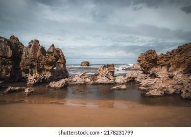 Summer Beach Landscape. Moody Beach Scenery In Dark Tones. Rocky Beach Wallpaper.