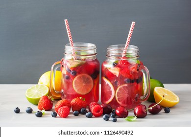 summer berry lemonade with lime and mint in mason jar - Powered by Shutterstock