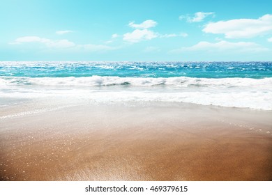 summer blue sky with few clouds and wet sand and free space  - Shutterstock ID 469379615