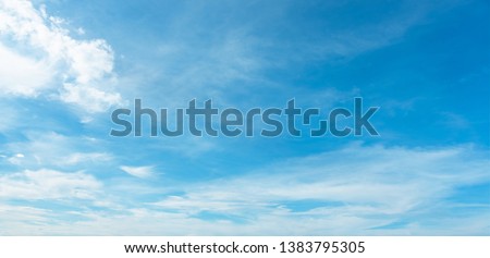 Summer blue sky soft clear Cloudy background. Puffy Clouds move by windy on noon concept Felling good-tempered relaxing  sunset wallpaper, sunrise journey to travel in tropical fog shiny mist style