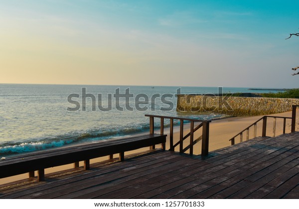 summer blurred sea
and sky with desk of
wood