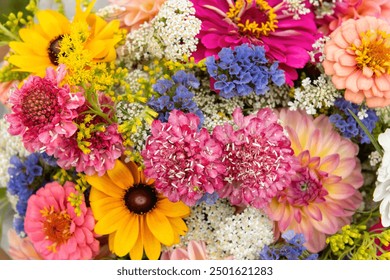 Summer bouquet. Beautiful multi colored fresh flower arrangement. Locally sourced flowers birthday bouquet close up. - Powered by Shutterstock