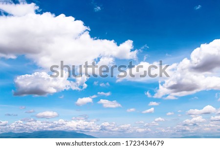 Summer bright blue sky with clouds outdoor background