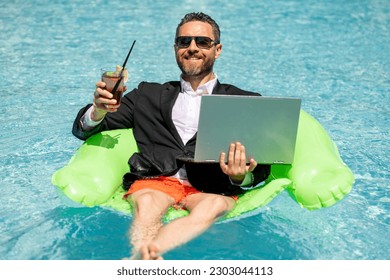 Summer business. Freelancer in summer swimming pool. Business man in wet suit in water. Crazy business summer vacation. Funny crazy businessman formal wear in swim pool. Hot business sumer. - Powered by Shutterstock