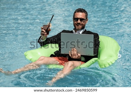Summer business. Freelancer in summer swimming pool. Business man in wet suit in water. Crazy business summer vacation. Funny crazy businessman formal wear in swim pool. Hot business sumer.