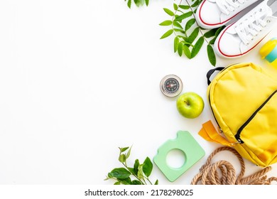 Summer Camping Concept Flatlay With A Backpack And Sneakers