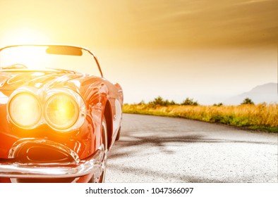Summer car on road  - Shutterstock ID 1047366097