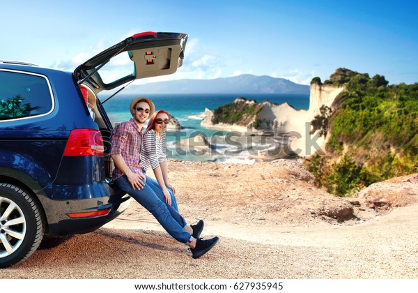 Summer car trip and
landscape of cliffs 
