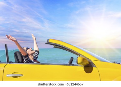 Summer Car Trip Vacation . Yellow Car At Background Of Sea Water. Travel, Freedom And Holidays Concept.