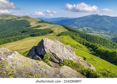 Summer in Carpathian mountains. View on the path from the top of a mountain ridge. 