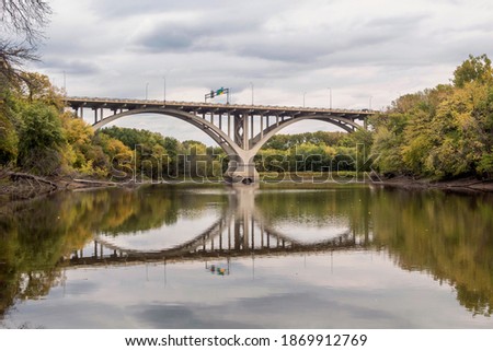 Summer Changes To Fall over the Mendota Bridge Spanning the Seasonally Low Waters of the Minnesota River in Mendota Heights