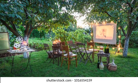 Summer Cinema With Retro Projector In The Evening