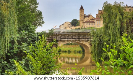 Summer city landscape - view of the bridges over the River Gers in the town of Auch, in the historical province Gascony, the region of Occitanie of southwestern France
