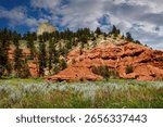 Summer Clouds over Devils Tower National Monument in the Belle Fourche River Valley in Wyoming.