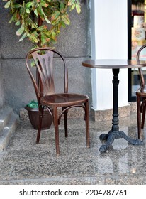 Summer Coffee Shop With Chairs And A Table. Beautiful Terrace With Beautiful Furniture. Background Texture. 