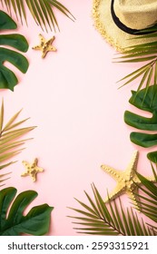 Summer composition flat lay. Palm leaves, sea shells, hat and sunglasses on pink background.