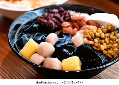 Summer Cool Down: Refreshing Taro Ball Shaved Ice. A beloved summer treat with shaved ice, taro balls, sweet potato balls, sugar water, and various toppings like red beans, green beans, and mung beans