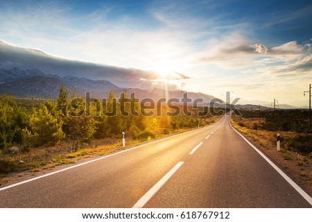 Summer country road with trees beside. Rural up hill, vintage , environment road.Nature road.Asphalt road.