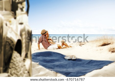 Summer day on beach and two lovers 