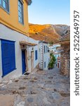 Summer day on a street in Greek town Hydra.