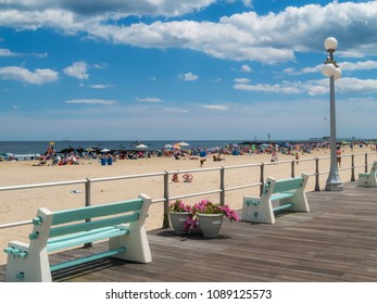 A Summer Day View Of The Beach And Boardwalk In Avon By The Sea Along The Jersey Shore.