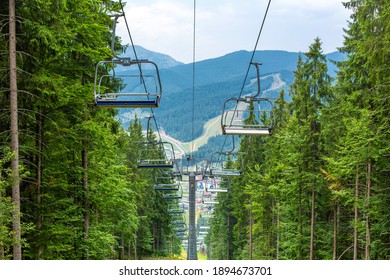 Summer day view of ski elevator in mountains.