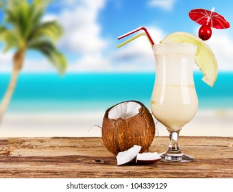 Summer Drink With Blur Beach On Background