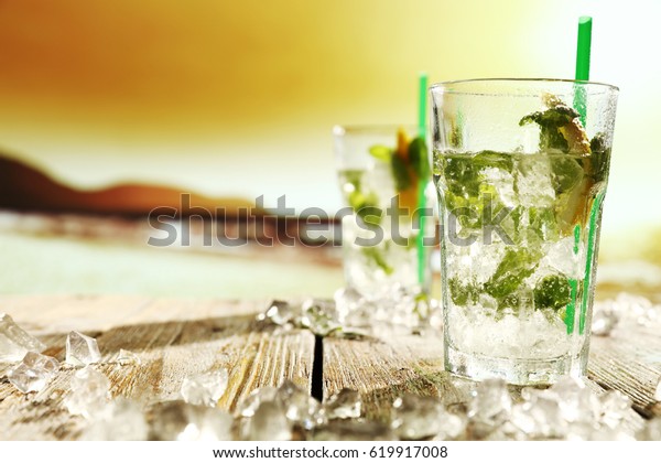 Summer Drink On Beach Sunset 600w 619917008 