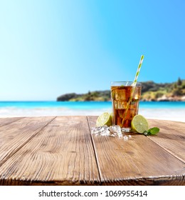 Summer Drink On Wooden Table And Beach Landscape. 