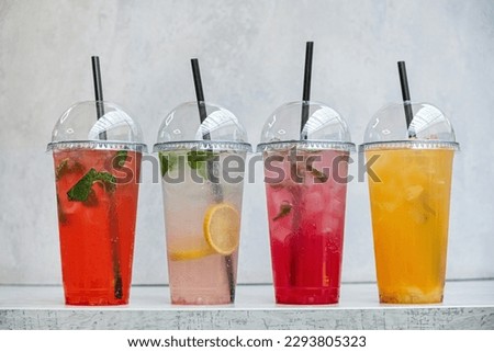 summer drinks in the plastic cups