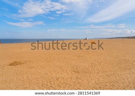 Summer at an empty beach in Gorleston, North Norfolk, UK with beautiful yellow sand