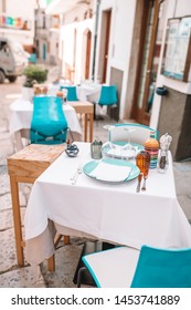 Summer Empty Outdoor Cafe At Old Tourist European City In Italy