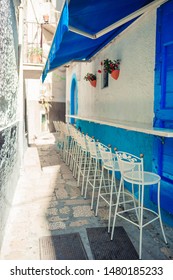 Summer Empty Outdoor Cafe At Old Tourist European City In Italy