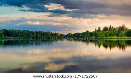 Summer Evening Sunset Lake and Cloudy day